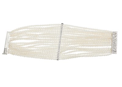 Lot 167 - An 18ct gold diamond cultured pearl bracelet