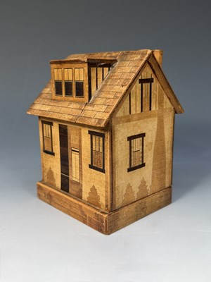 Lot 334 - A Japanese novelty puzzle money box, in the...