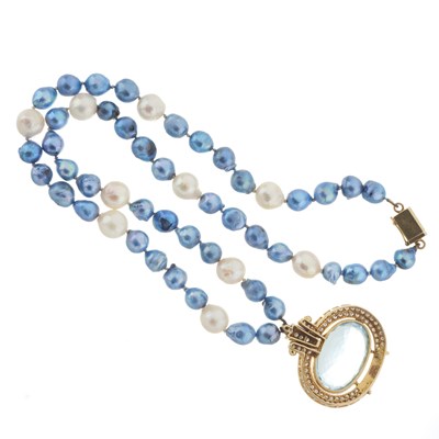 Lot 32 - An 18ct gold blue topaz and diamond pendant, with pearl chain