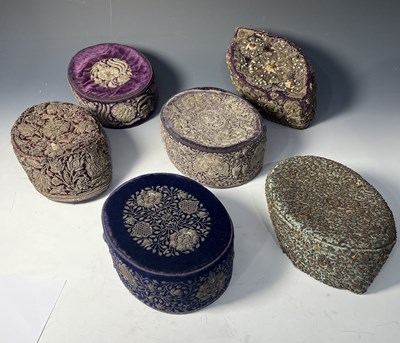 Lot 5 - A group of six South Asian topi-type hats,...