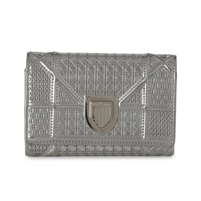 Lot 329 - Christian Dior, a silver Micro-Cannage Diorama trifold wallet.