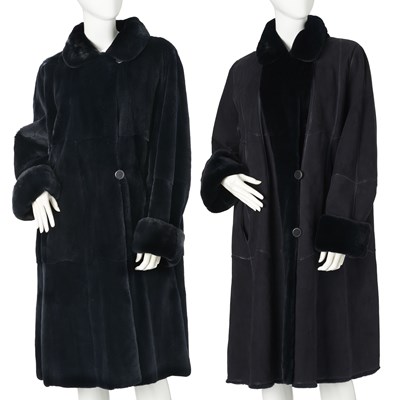 Lot 539 - A reversible blue shearling coat.