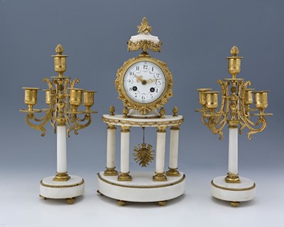 Lot 338 - A French clock garniture, early 20th Century,...