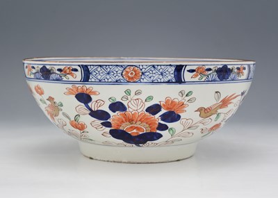 Lot 351 - A Japanese Imari punch bowl, Edo, footed form,...