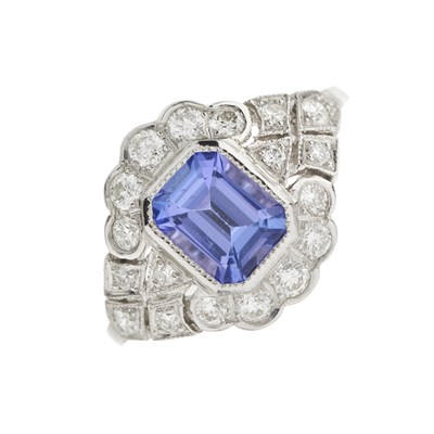 Lot 164 - A platinum tanzanite and diamond cluster ring