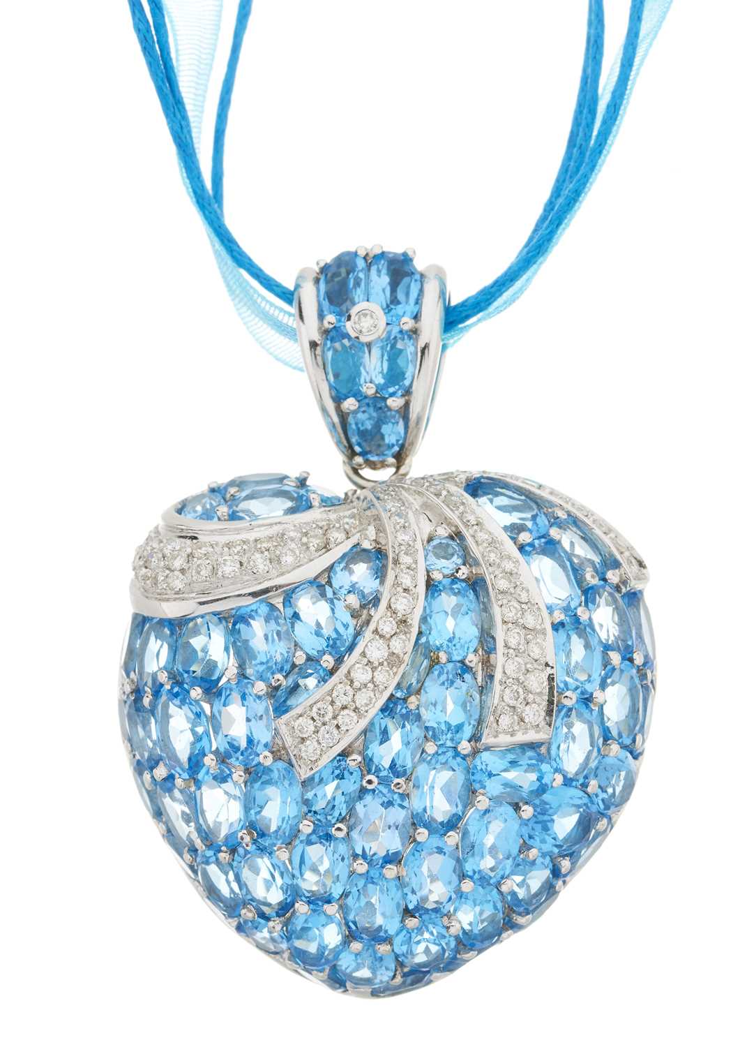 Lot 75 - An 18ct gold blue topaz and diamond heart-shape pendant