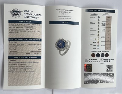 Lot 80 - An 18ct gold unheated Sri Lankan sapphire and diamond cluster ring