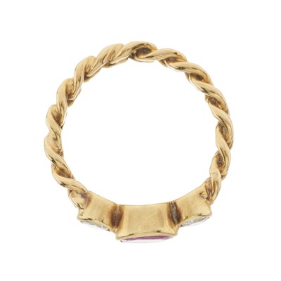 Lot 39 - An 18ct gold ruby and brilliant-cut diamond three-stone ring