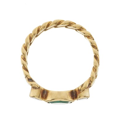 Lot 41 - An 18ct gold emerald and diamond three-stone ring