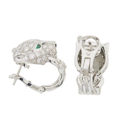 Lot 62 - Cartier, a pair of 18ct white gold diamond, emerald and onyx Panthere de Cartier earrings