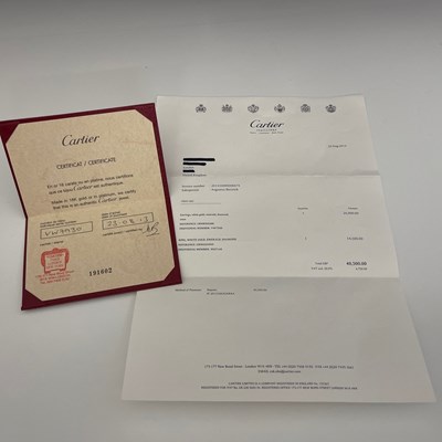 Lot 62 - Cartier, a pair of 18ct white gold diamond, emerald and onyx Panthere de Cartier earrings