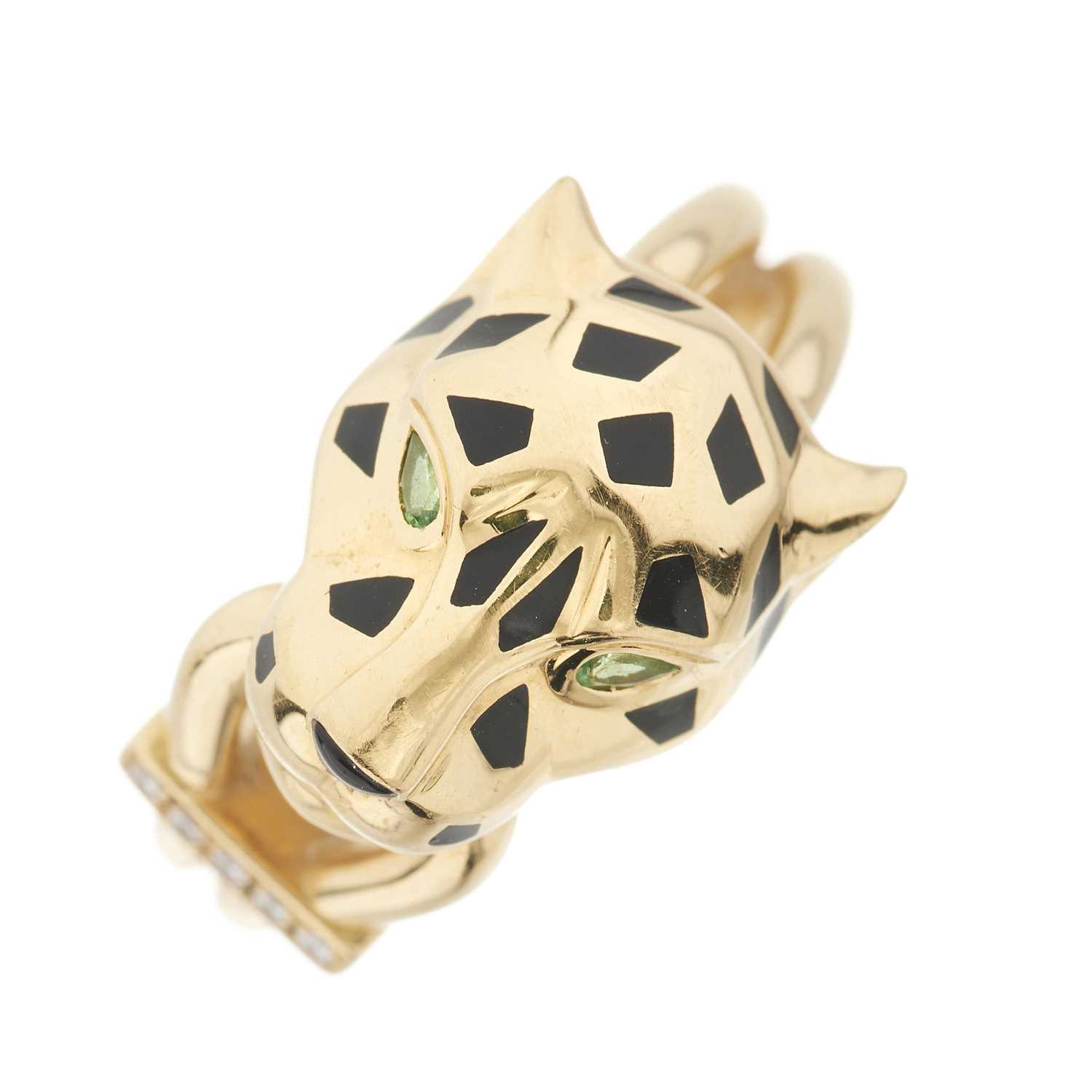Lot 59 - Cartier, an 18ct gold diamond, green garnet, onyx and black lacquer Panthere de Cartier ring
