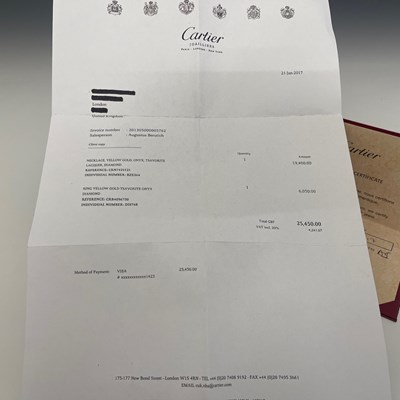 Lot 59 - Cartier, an 18ct gold diamond, green garnet, onyx and black lacquer Panthere de Cartier ring