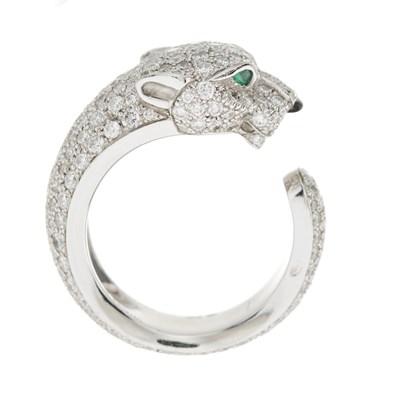 Lot 63 - Cartier, an 18ct white gold diamond, emerald and onyx Panthere de Cartier ring