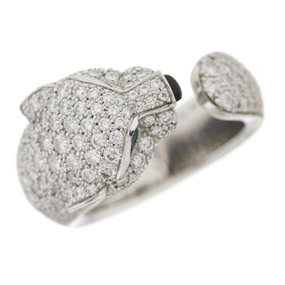 Lot 63 - Cartier, an 18ct white gold diamond, emerald and onyx Panthere de Cartier ring