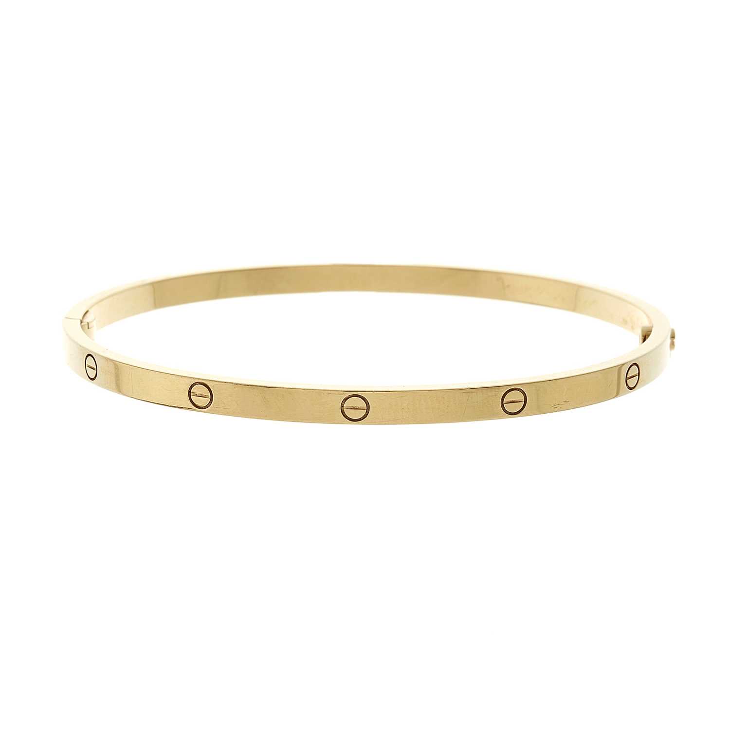 Lot 59 - Cartier, an 18ct gold Love bangle bracelet,...