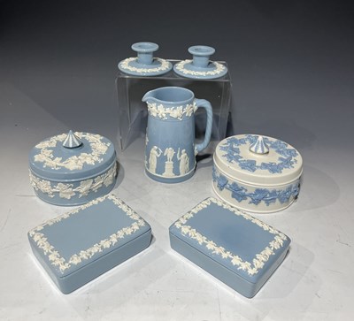 Lot 239 - A near pair of Wedgwood clear glazed embossed '...