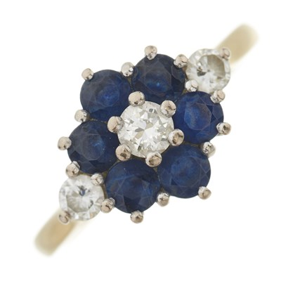 Lot 57 - An 18ct gold sapphire and diamond cluster ring