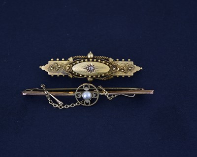Lot 14 - Two early 20th century gold gem-set brooches