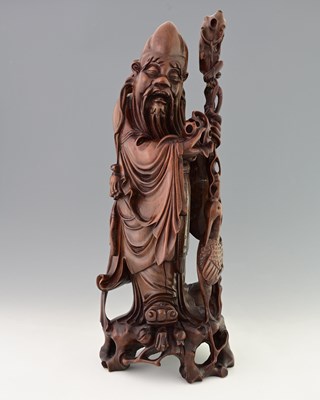 Lot 378 - A large Chinese carved hardwood figure of...