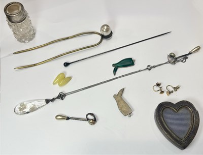 Lot 434 - A selection of items, including silver topped perfume bottle