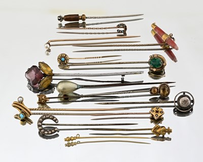 Lot 463 - A selection of mostly Victorian to early 20th century gem stickpins and a later paste bar brooch