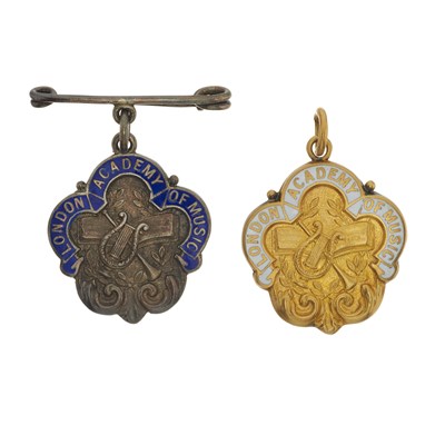 Lot 44 - Two early 20th century 9ct gold and silver, enamel London Academy of Music medallions, cased