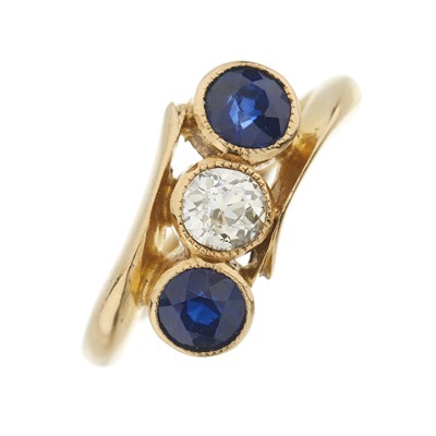 Lot 7 - A sapphire and old-cut diamond three-stone ring