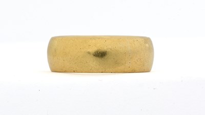 Lot 472 - A mid 20th century 22ct gold band ring