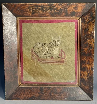 Lot 546 - A Victorian embroidered picture of a cat, in...