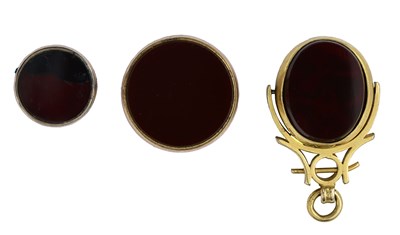 Lot 386 - A Victorian carnelian and bloodstone swivel fob, with two similarly set gem fob components