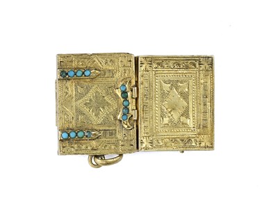 Lot 394 - A late 19th century gold turquoise book locket pendant