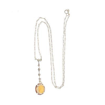 Lot 80 - A mid 20th century orange topaz drop pendant,...