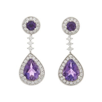 Lot 115 - A pair of 18ct gold amethyst and diamond cluster earrings