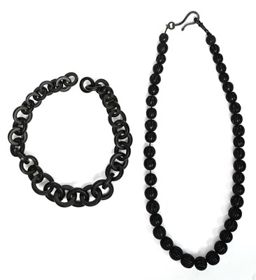 Lot 392 - A Victorian vulcanite chain and a Victorian black gem bead Albert