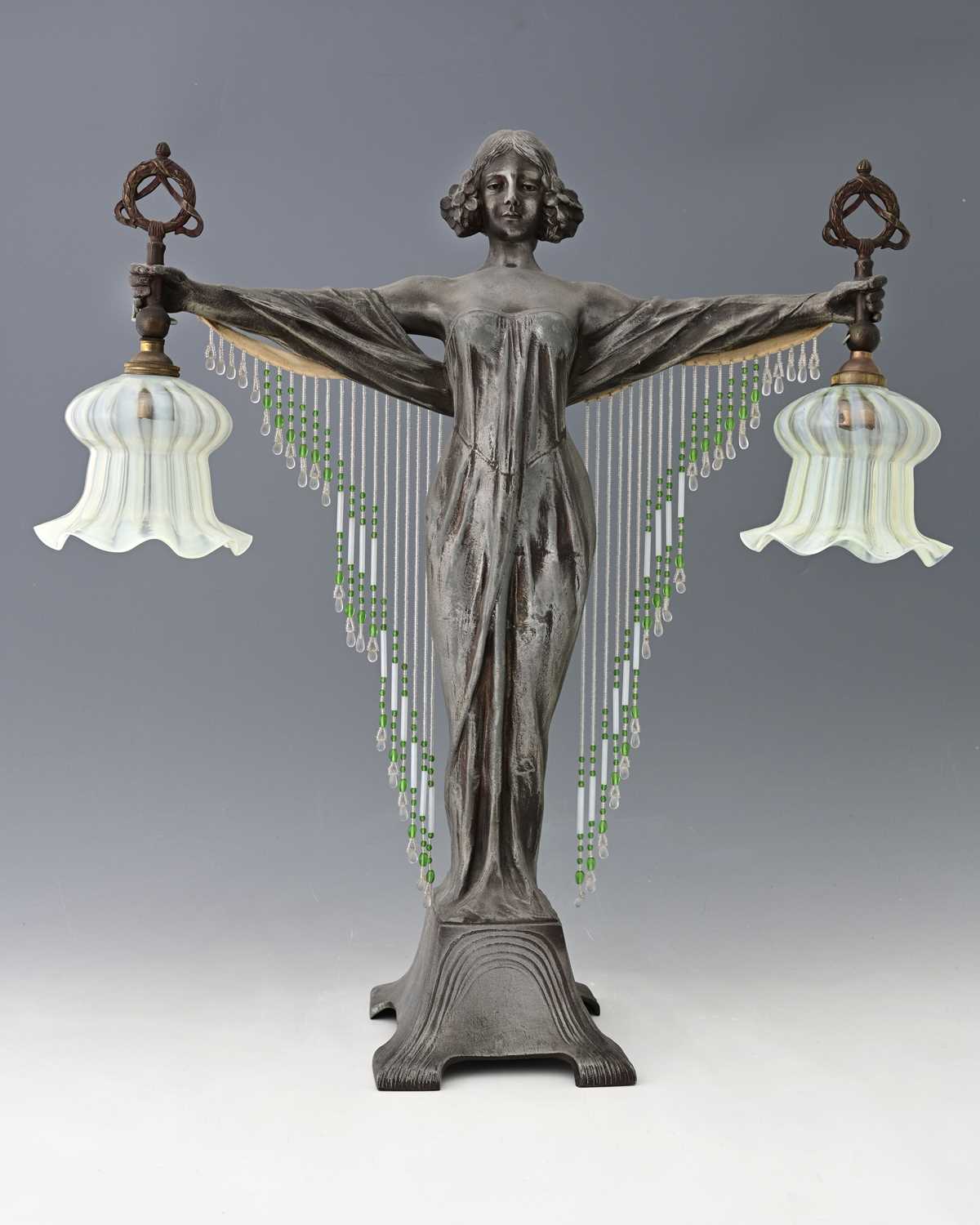 Lot 84 - An Art Nouveau art metal figural table lamp,...