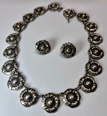 Lot 444 - A pair of Norseland flower earrings and matching necklace