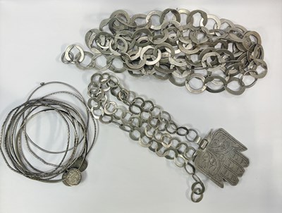 Lot 428 - Two white metal necklaces and nine bangles