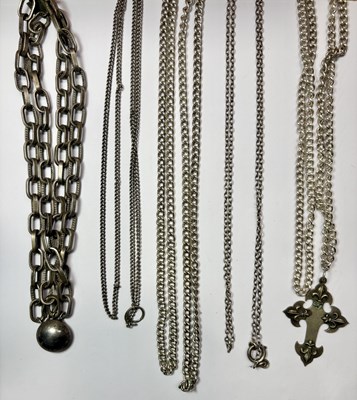 Lot 419 - Four white metal chain necklaces, one pendant and a bracelet