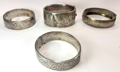 Lot 403 - A selection of silver bangles