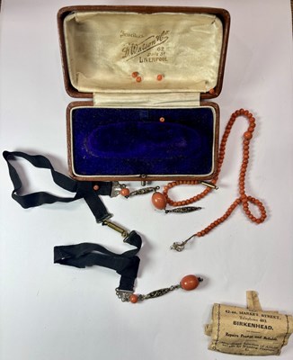 Lot 447 - A Victorian coral bead necklace with looses beads, and an early 20th century paste necklace