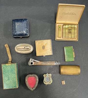 Lot 221 - A selection of items to include compacts, lighters, frames etc.