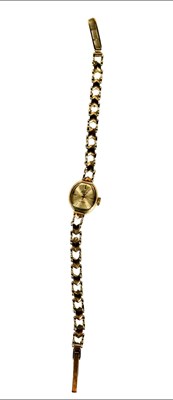 Lot 458 - Accurist, a 9ct gold manual wind bracelet...