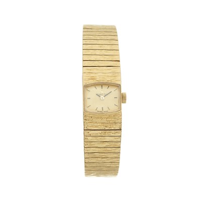Lot 203 - Omega, an 18ct gold bracelet watch