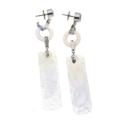 Lot 99 - A pair of carved lavender jade drop earrings,...