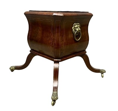 Lot 583 - A Regency mahogany strung jardiniere, of...