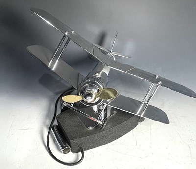 Lot 291 - An Art Deco style lamp, formed as a biplane,...