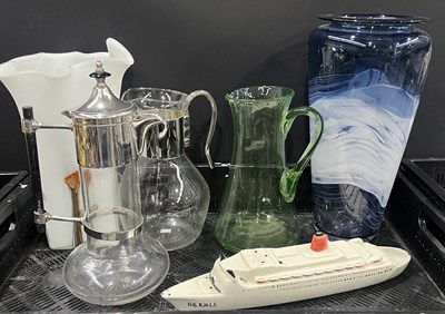 Lot 61 - A metal mounted glass claret jug in the manner...