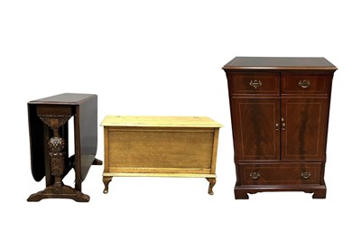 Lot 624 - A Jacobethan style oak drop leaf dining table,...