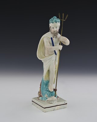 Lot 631 - A Staffordshire pearlware figure of Neptune,...